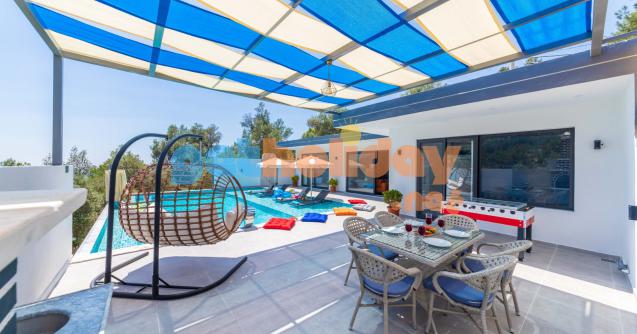 Villa DK Kalkan İslamalar Köyünde konumlanan Muhafazakar Aile ve balayı , iki yatak odalı olup dört kişi kapasitesine sahip villamızdır.