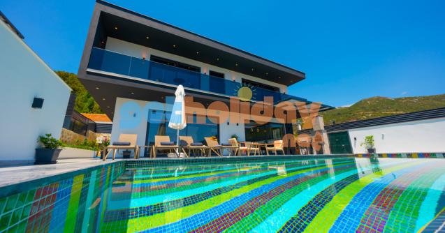 Kalkan İslamlar Köyünde konumlanan Çocuk havuzlu Muhafazakar Balayı Villası Güneyim İki yatak odalı